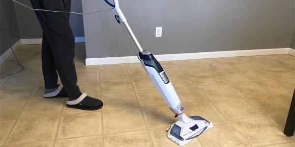 Person using Bissell Steam Mop PowerFresh Deluxe 1806